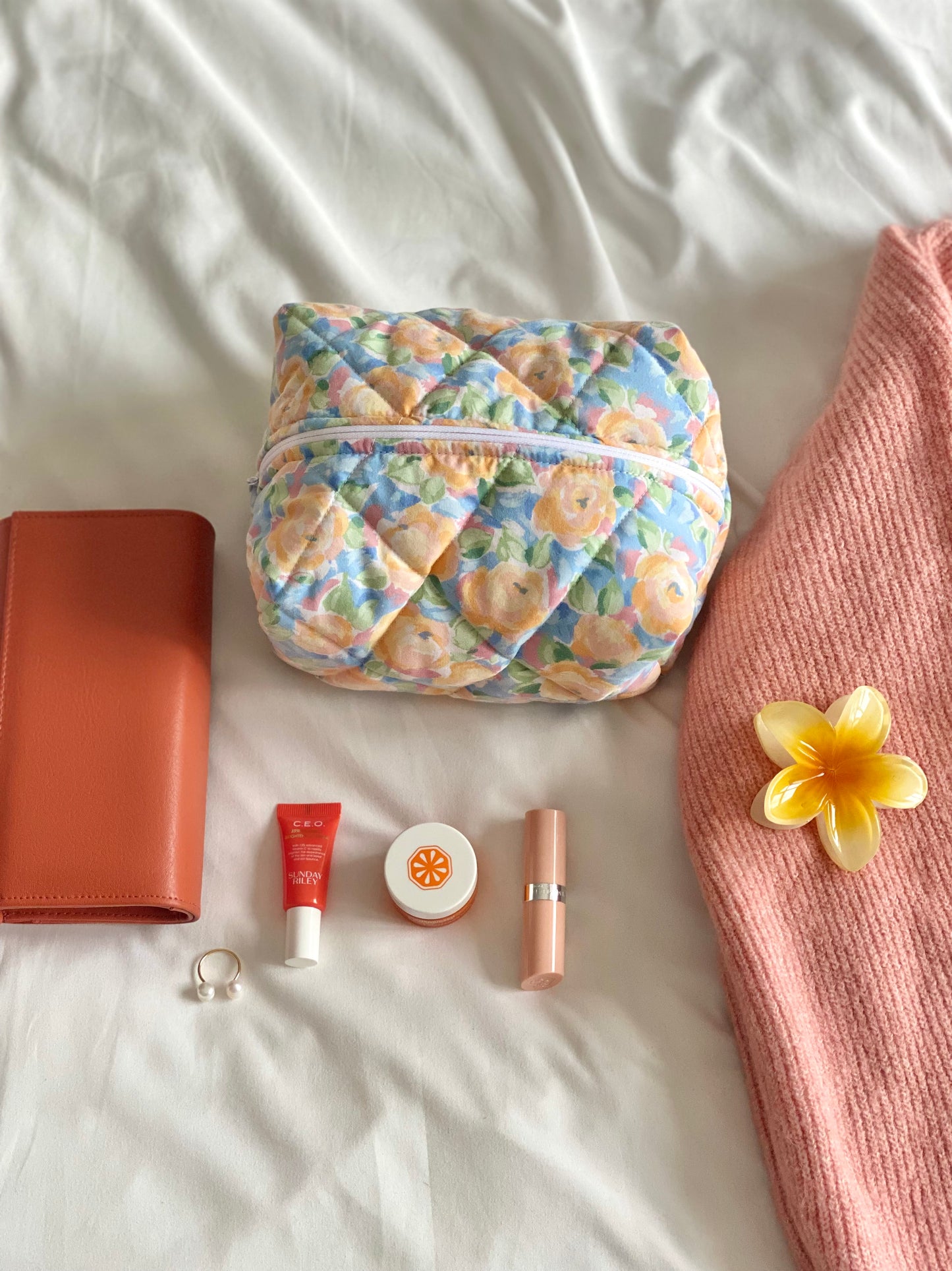 Trousse de maquillage pêche, bleu et rose tendre